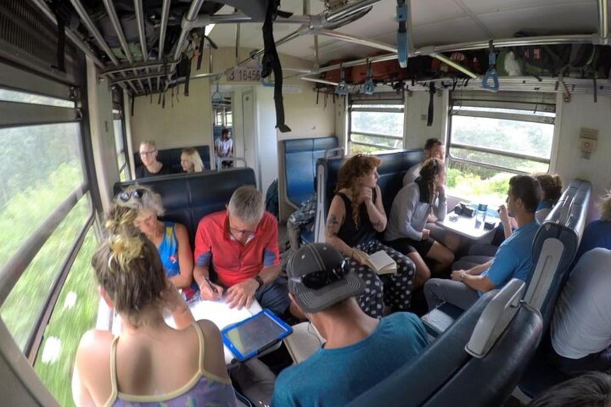 a group of people sitting in a bus