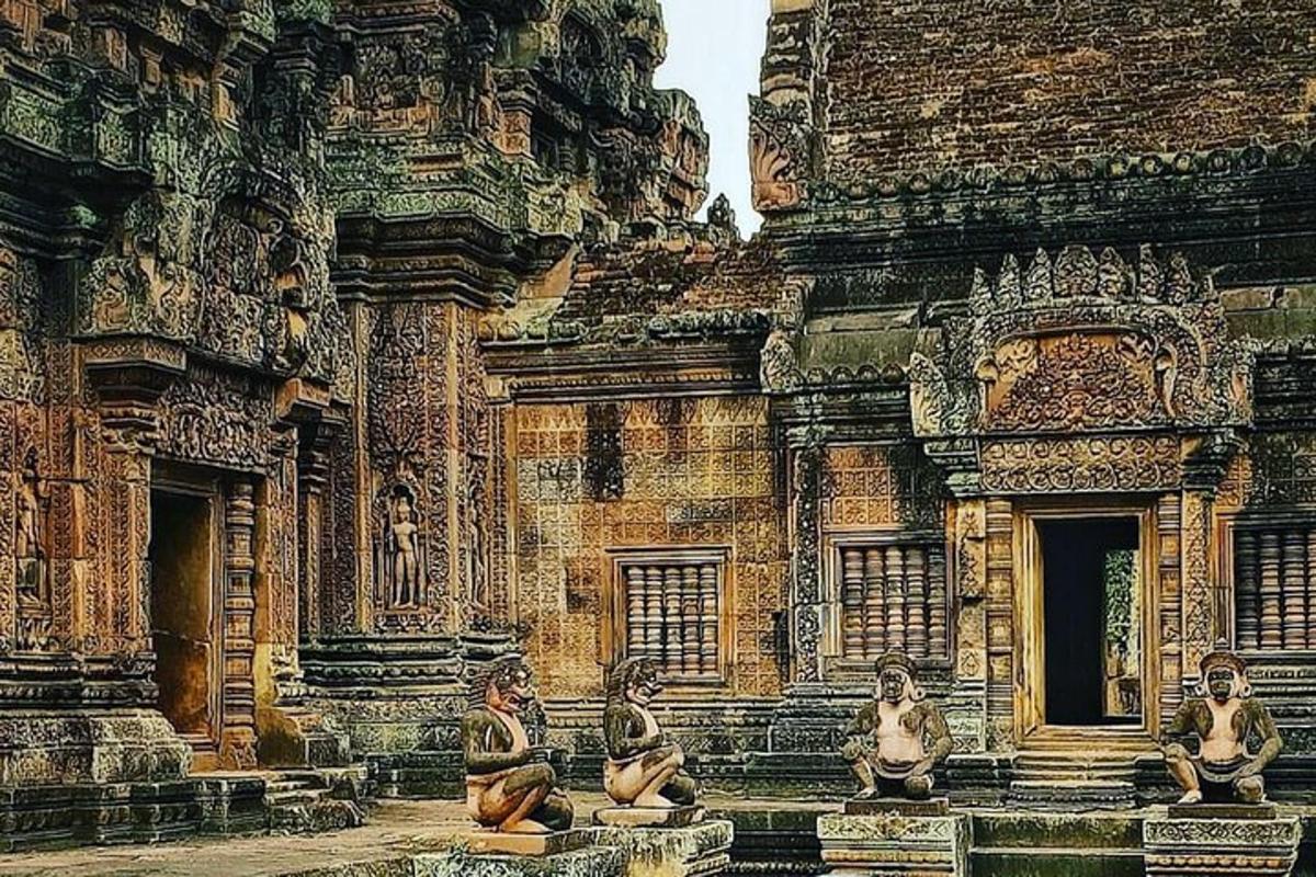 a building with statues of people sitting in front of it