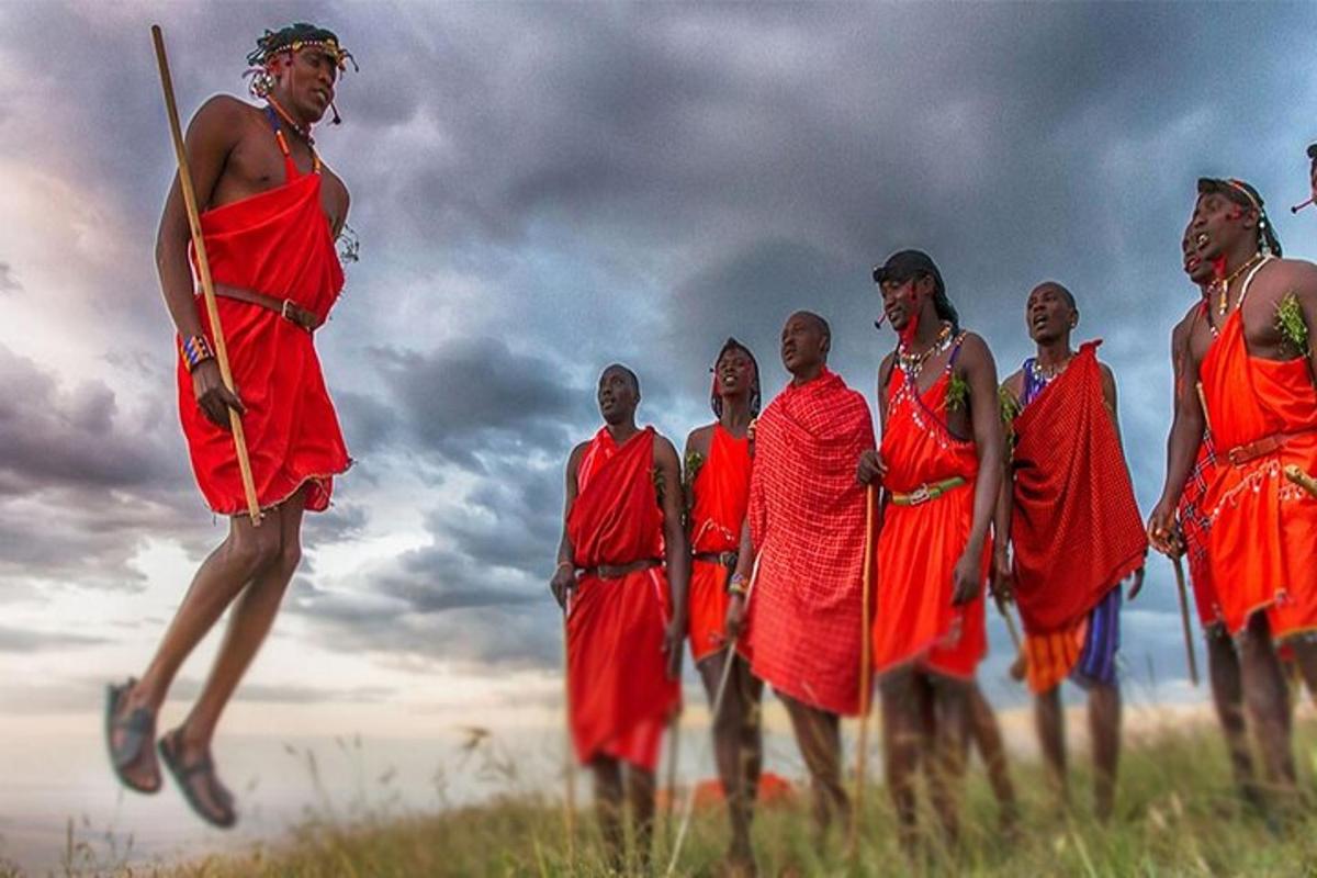 a group of people standing in a field