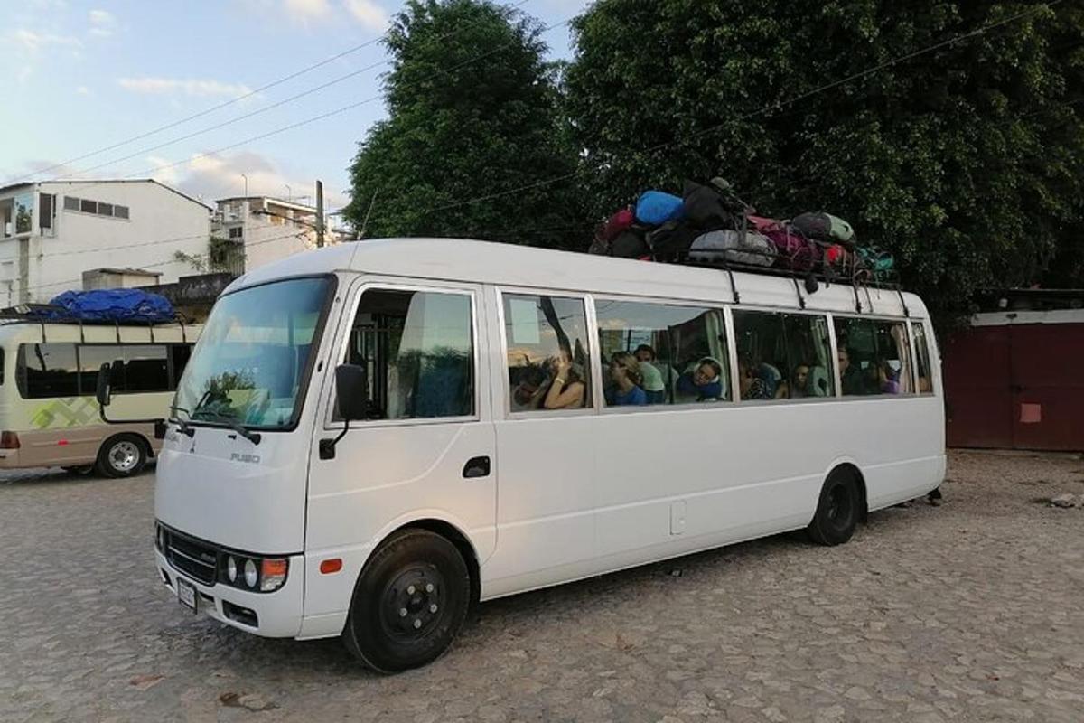 a white van with people sitting inside of it