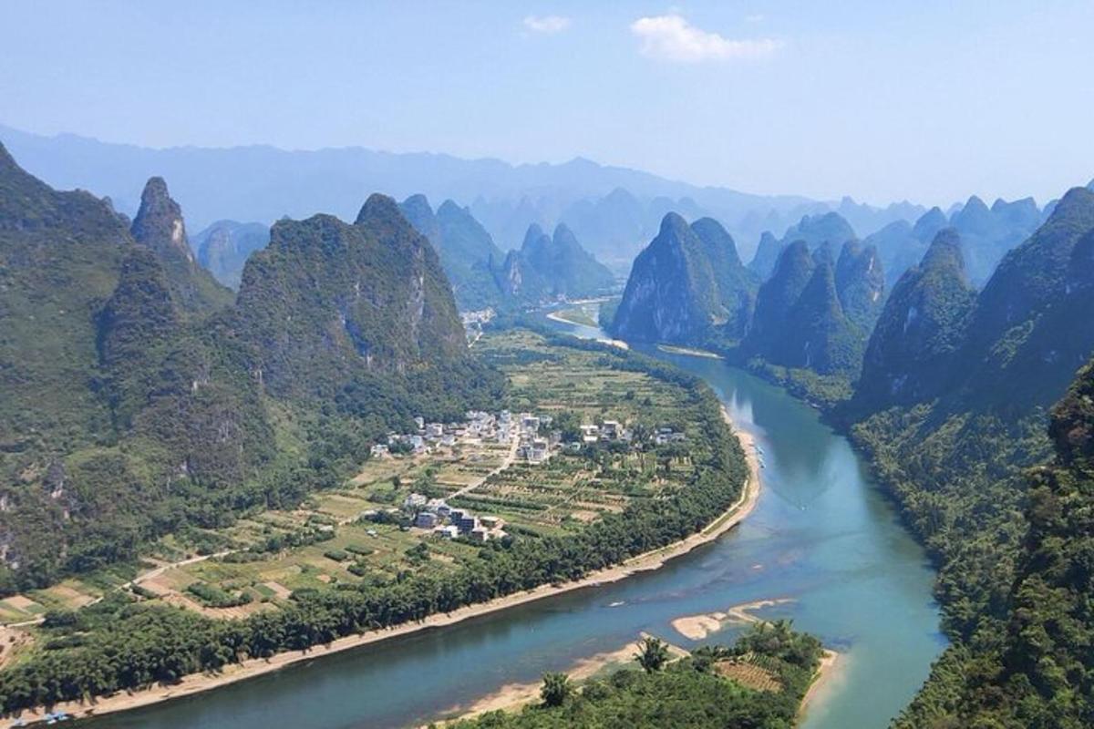 an aerial view of a river in the mountains