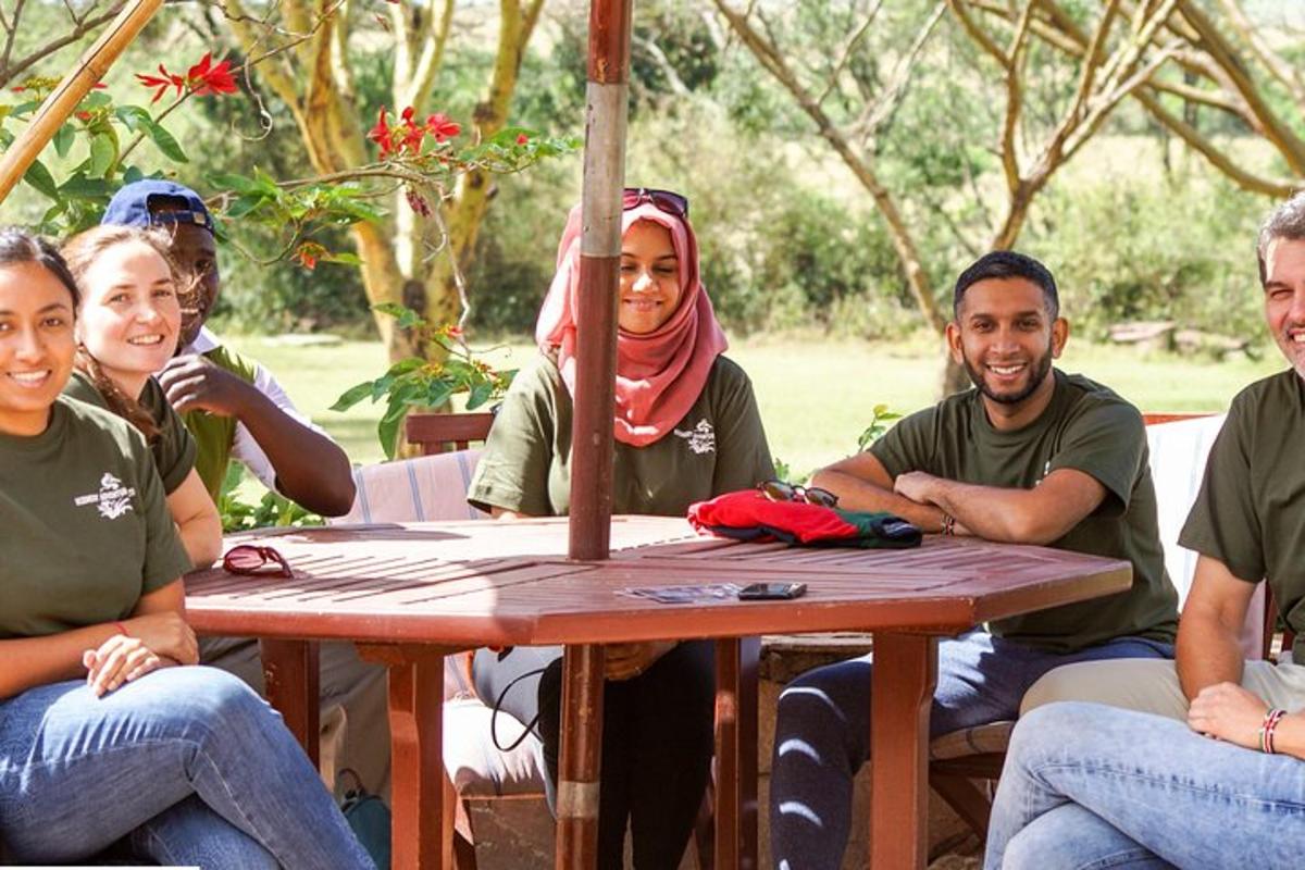 a group of people sitting around a table