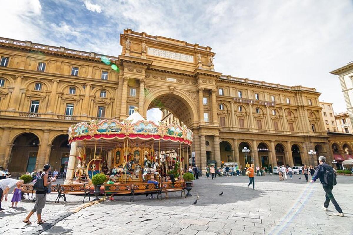 a large building with a carousel in front of it