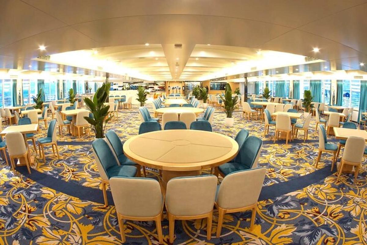 a large room with a table and chairs