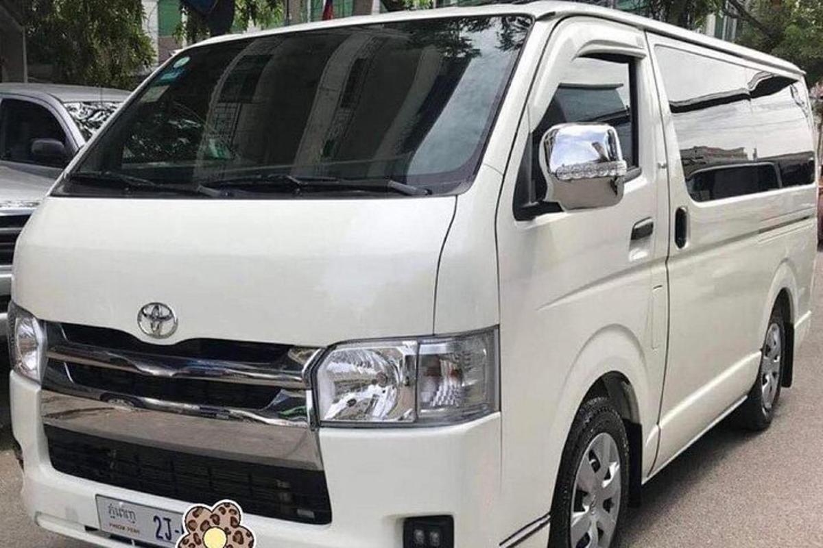 a white van parked in a parking lot