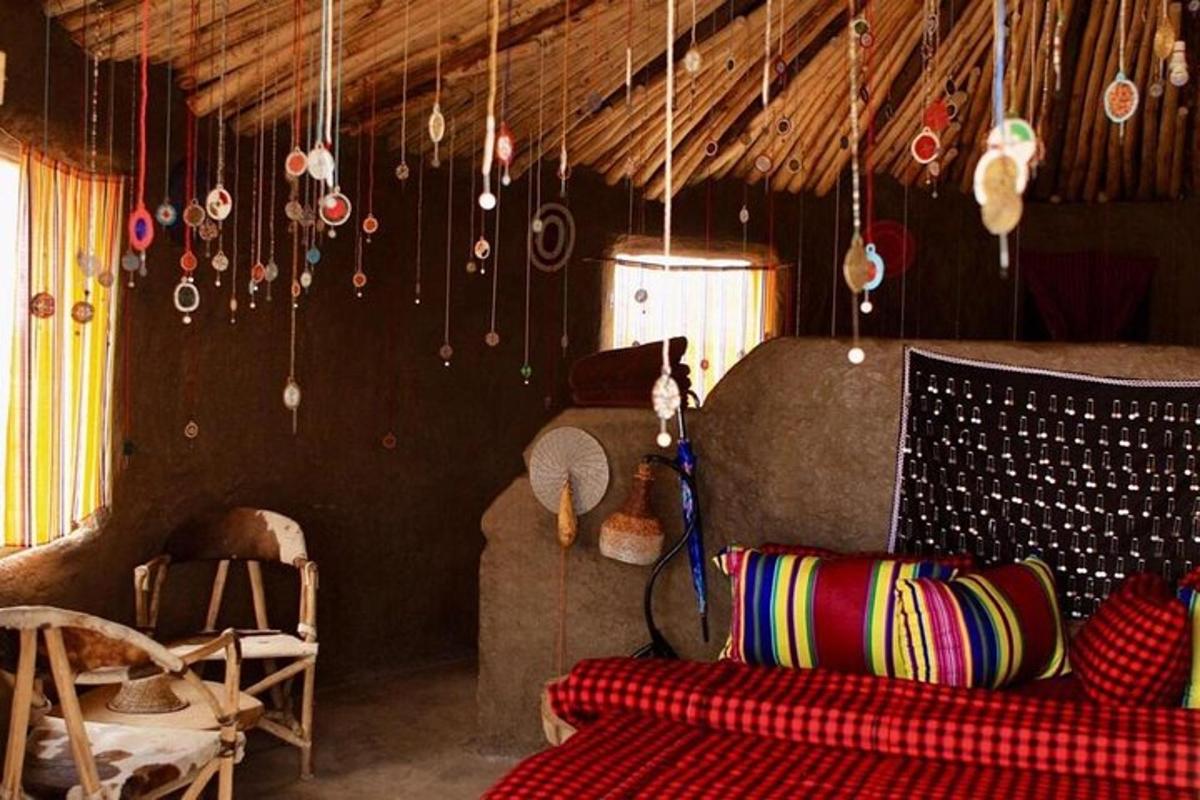 a living room with a couch and some hanging decorations