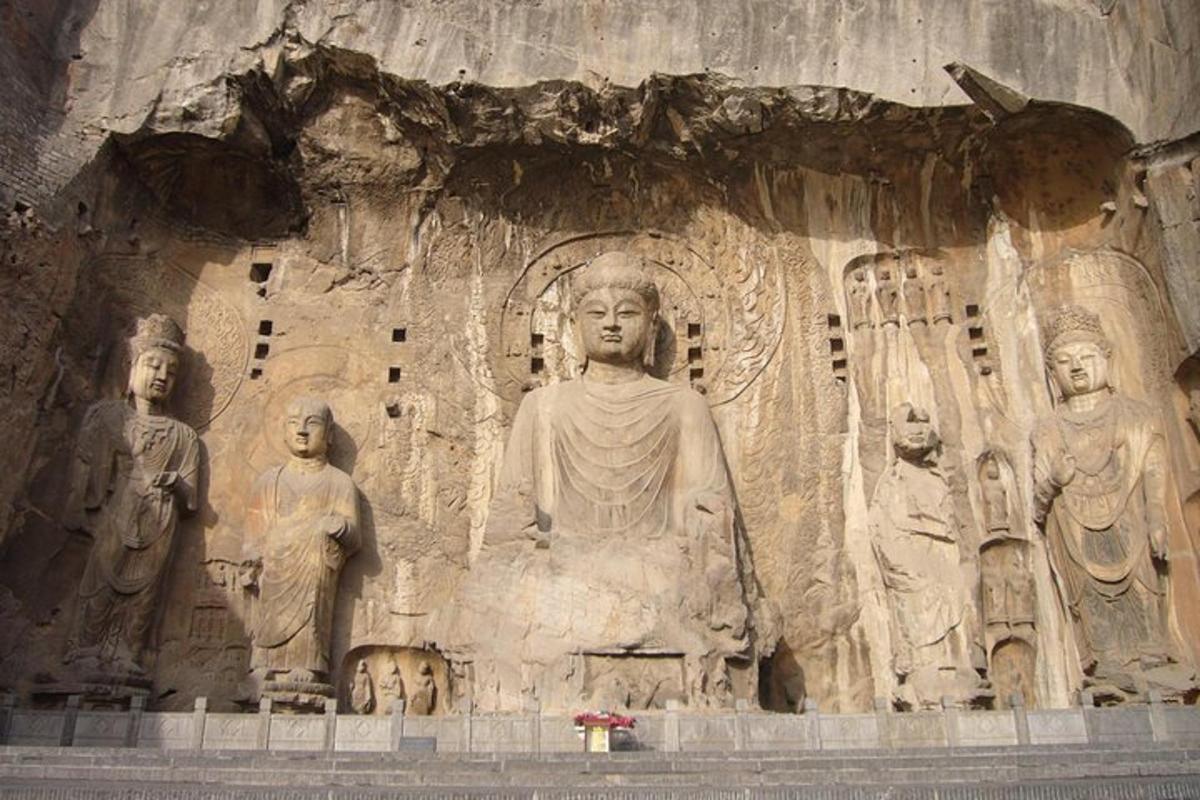 a large statue on the side of a wall
