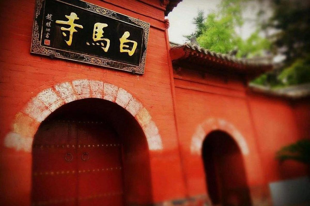 a red building with a sign on top of it