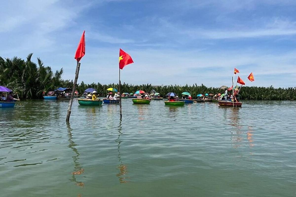 a group of boats with red flags in the water