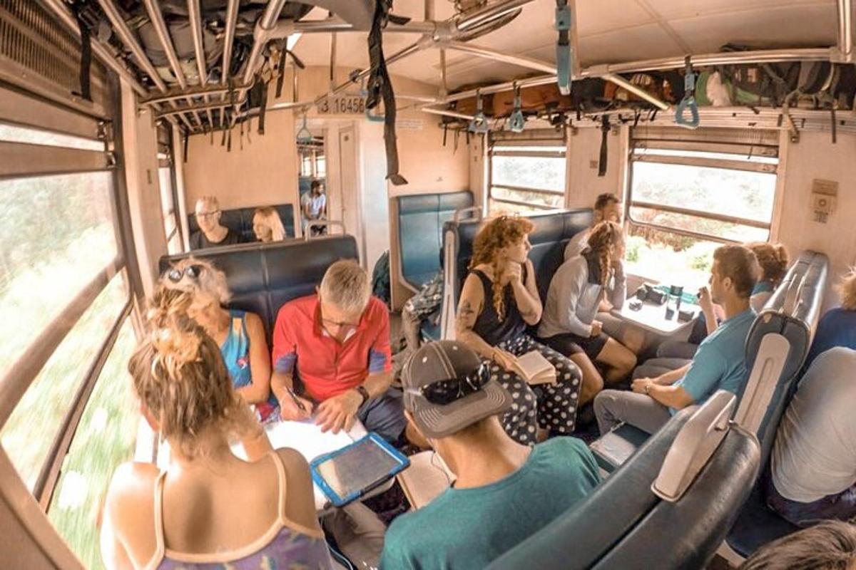 a group of people sitting in a bus
