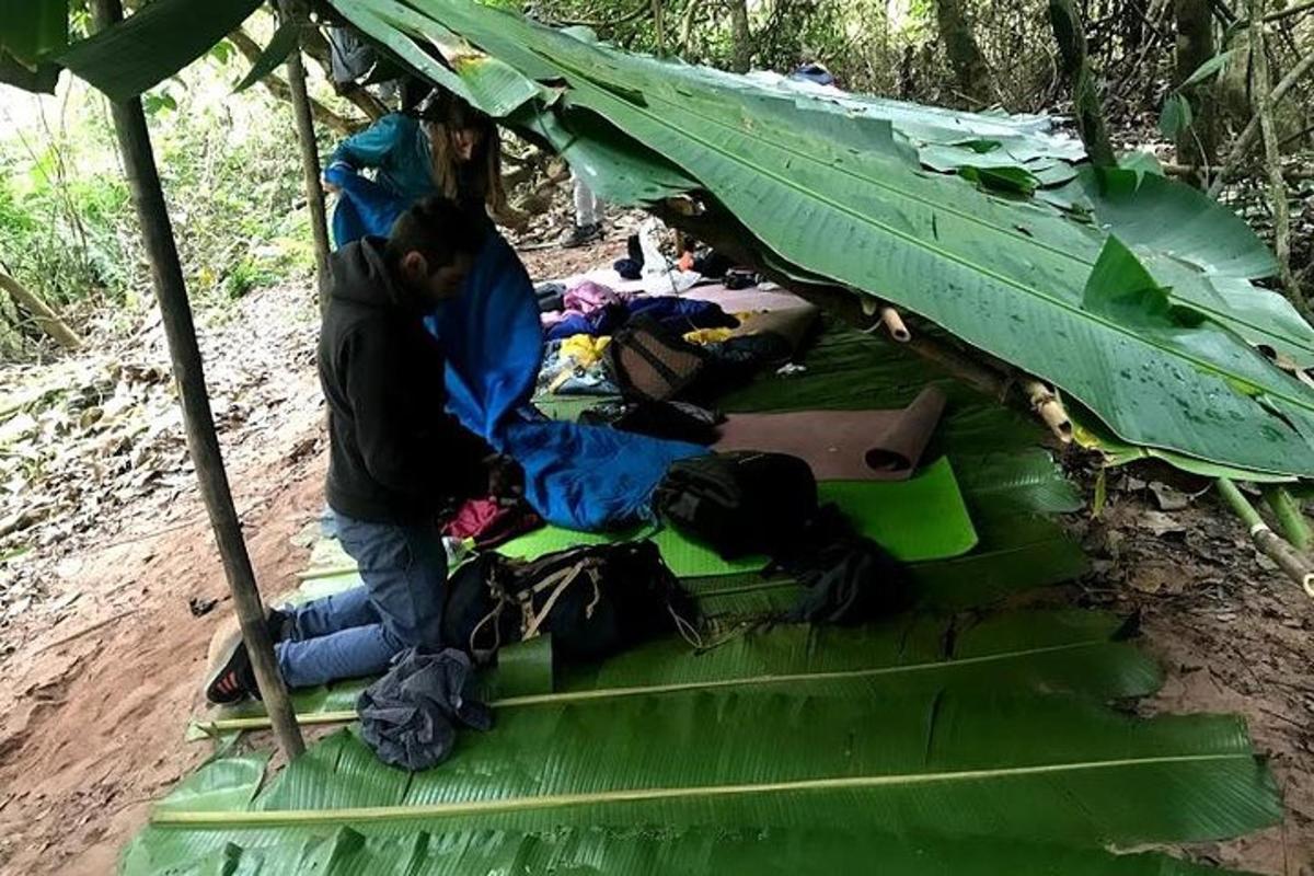 a group of people sleeping under a tent