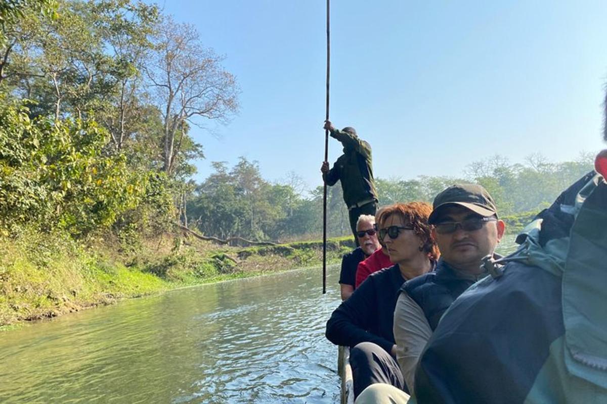 a group of people on a boat on a river