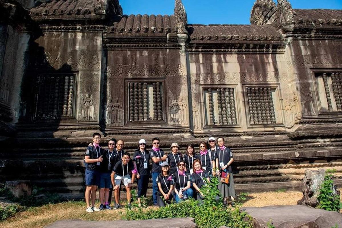 a group of people standing in front of a building