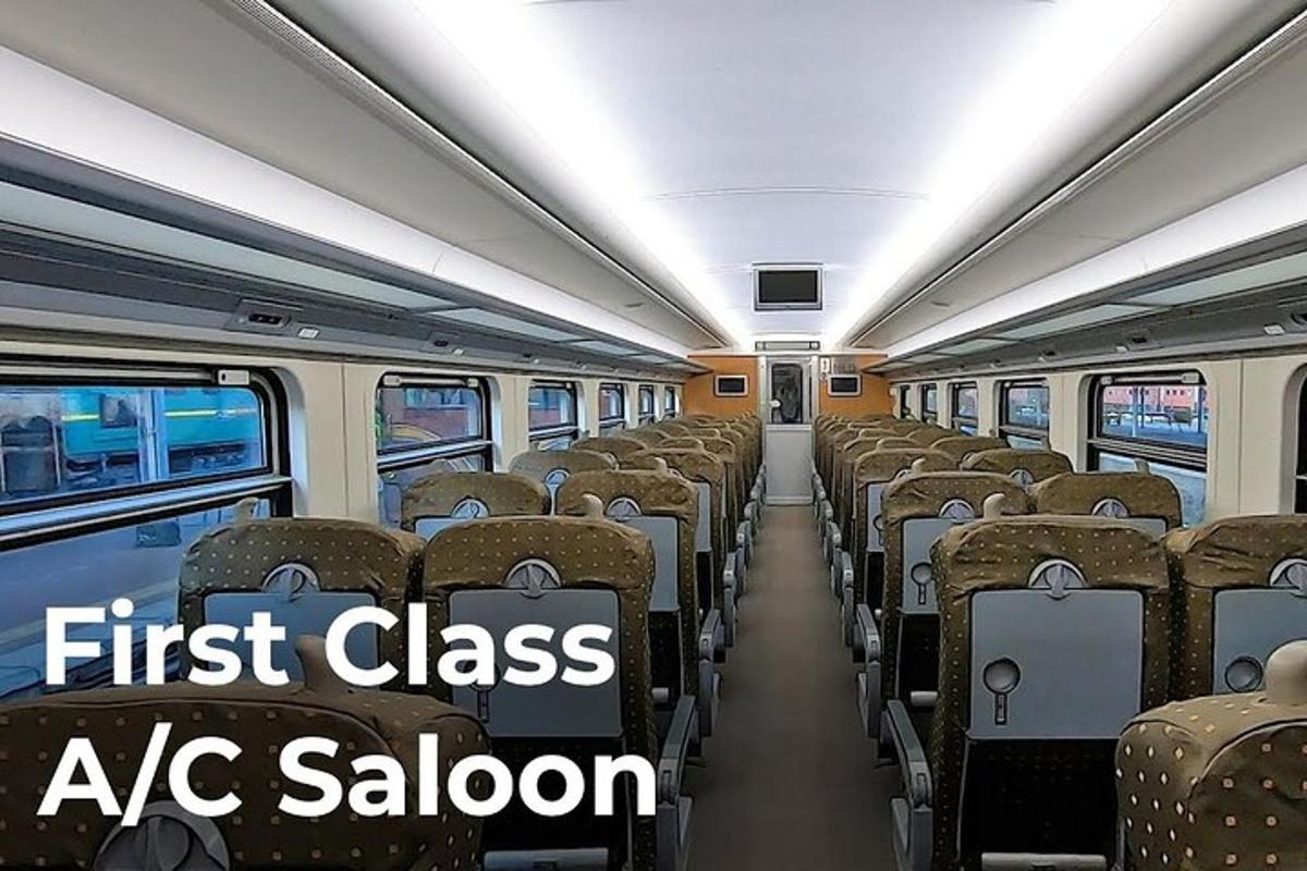 a train car with empty seats on a subway train