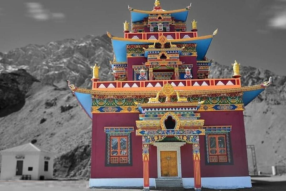 a large building in the middle of a mountain