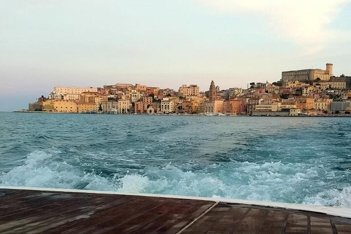 a view of a city from the water on a boat