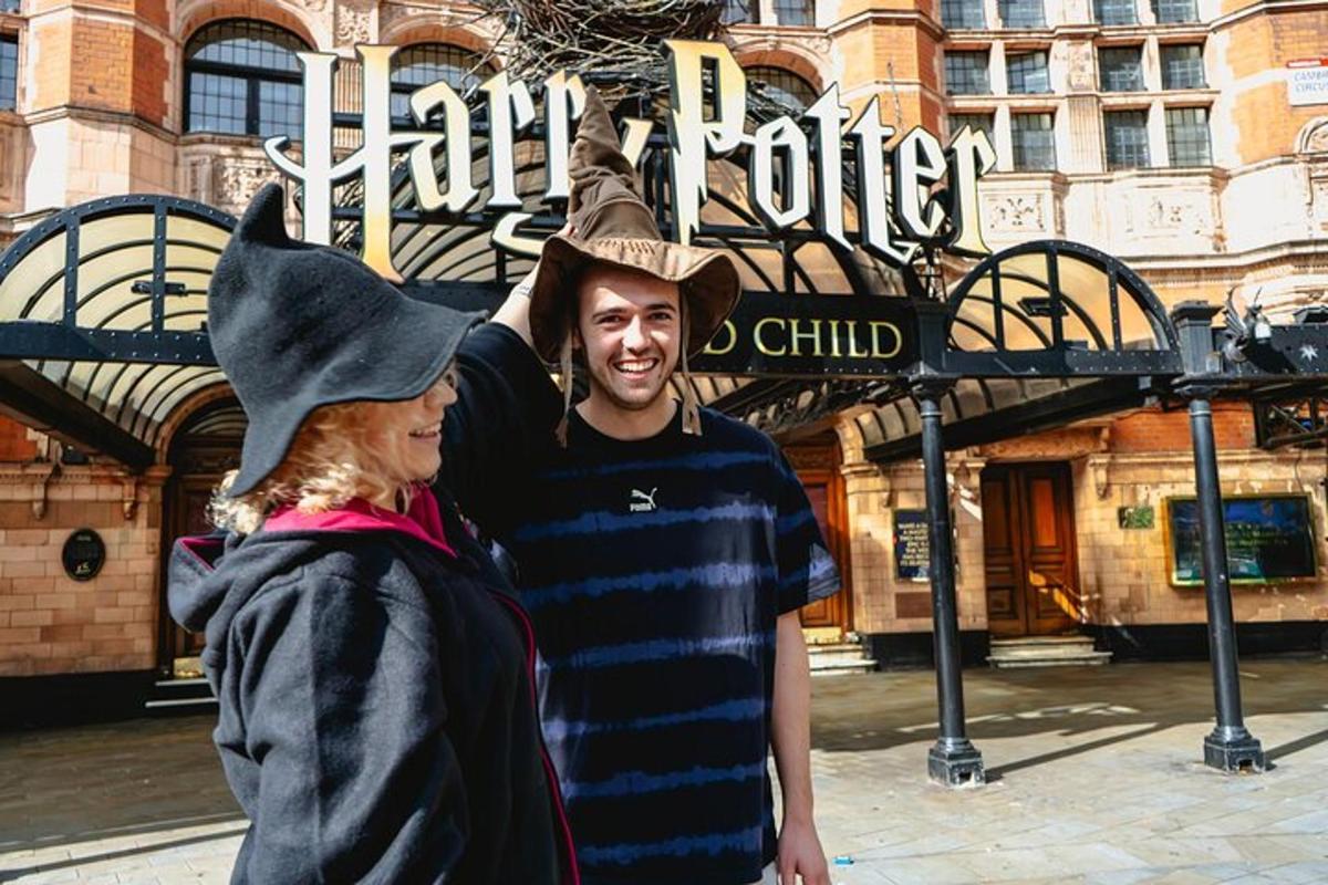 a man and a woman dressed up in witch costumes