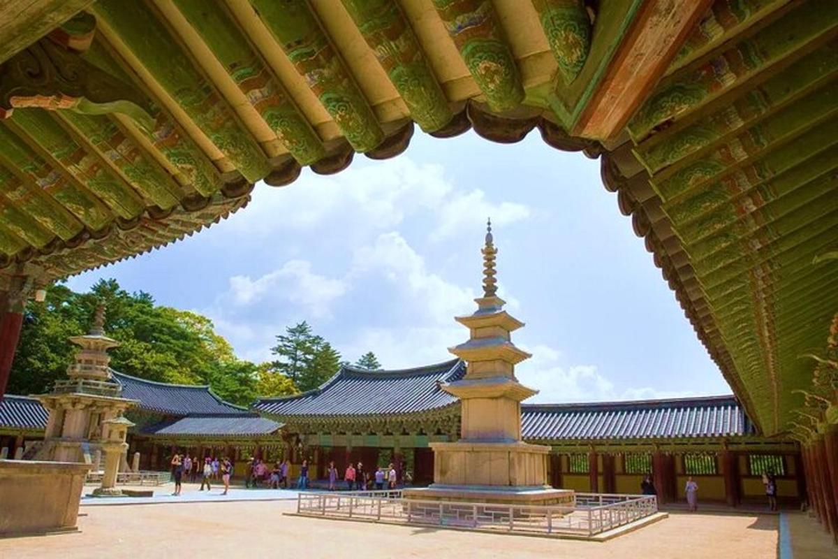 a temple with a tower in the middle of a building