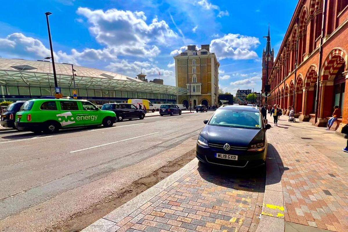 a car parked on the side of a city street