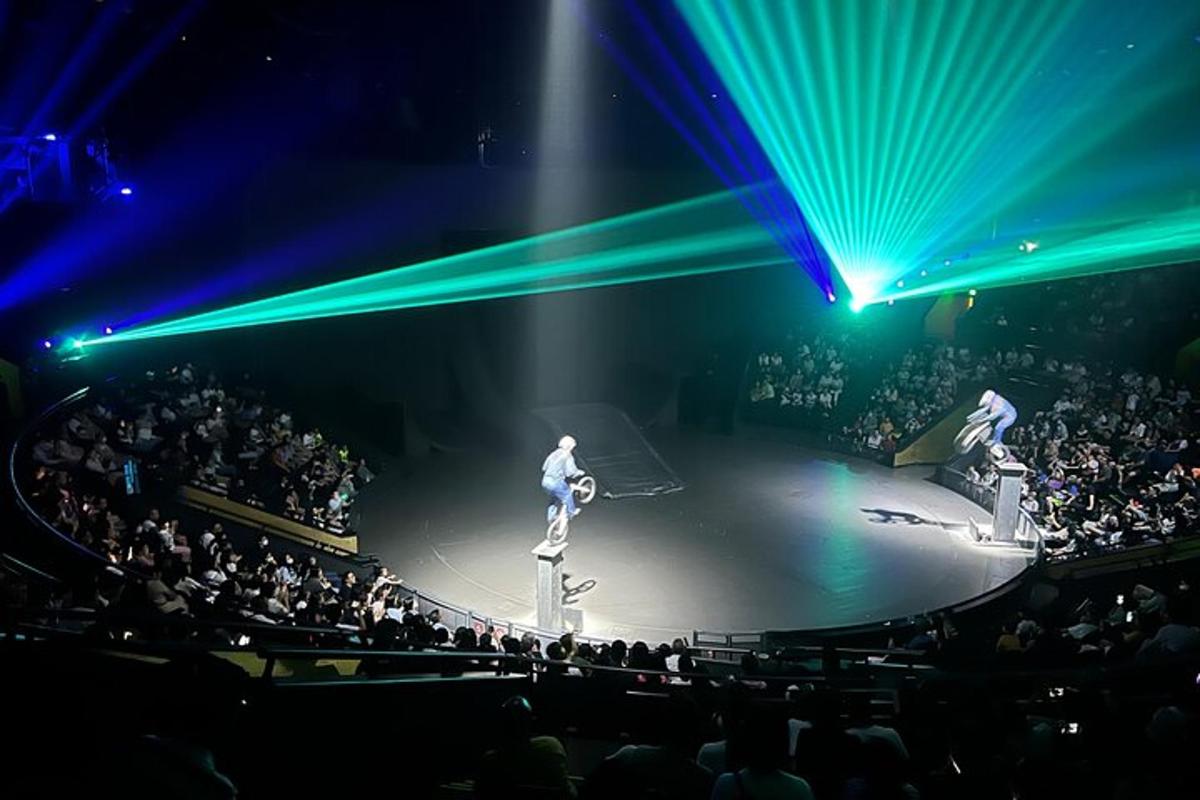 a man on a stage in front of a crowd