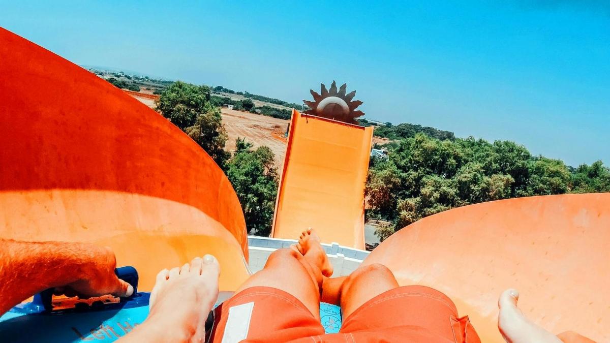 a person laying on a raft with their feet up on