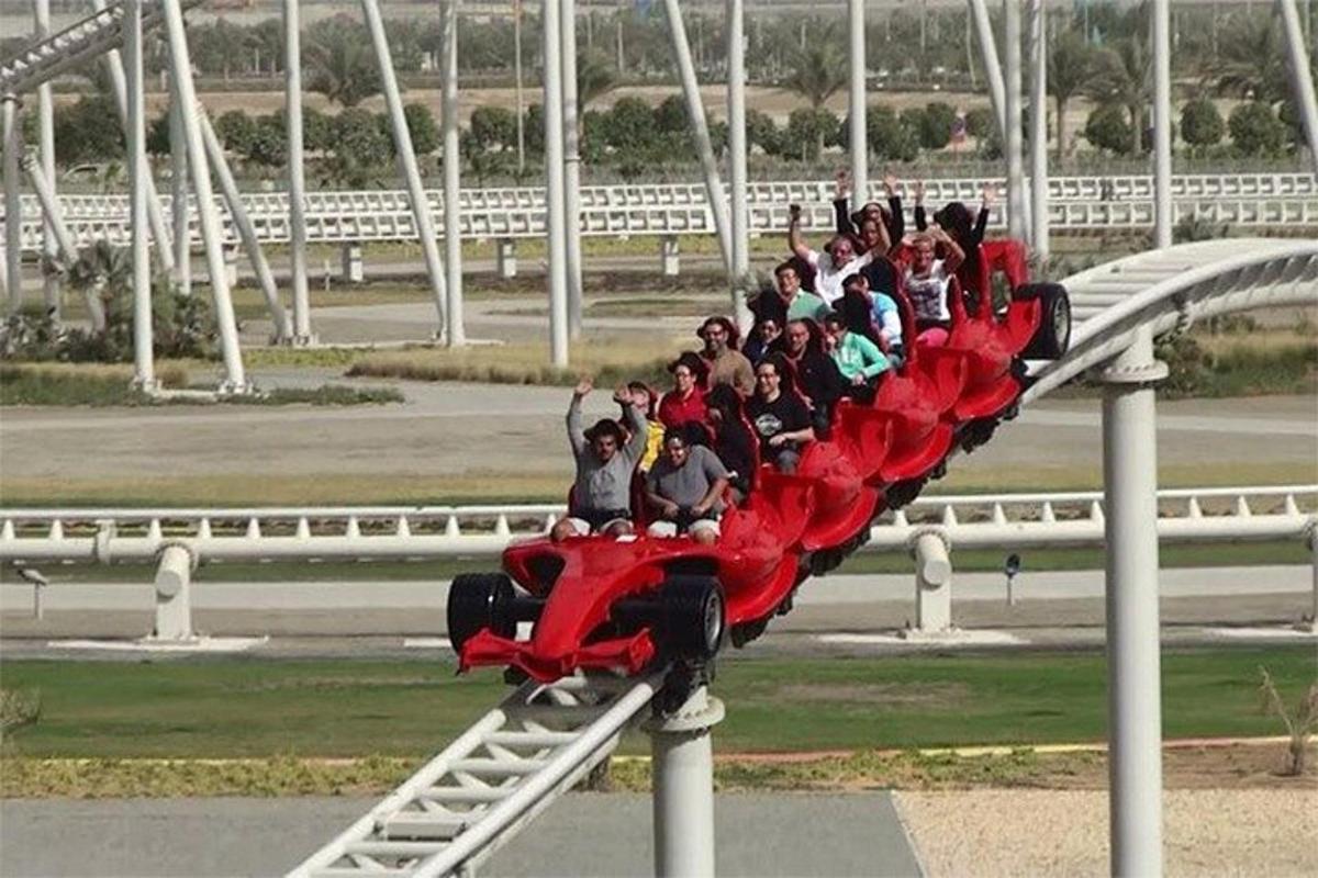 a group of people riding on a roller coaster