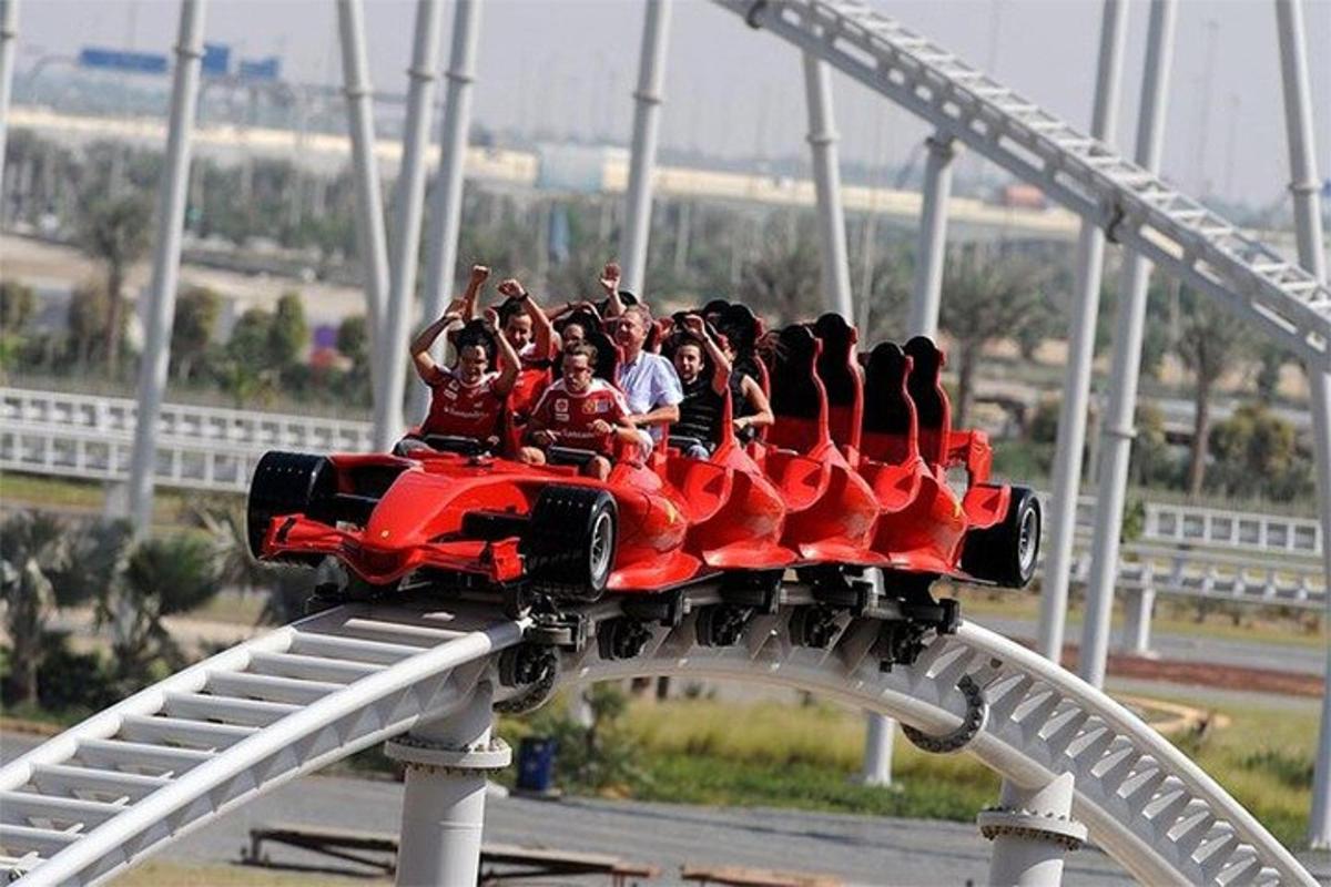 a group of people riding on a roller coaster