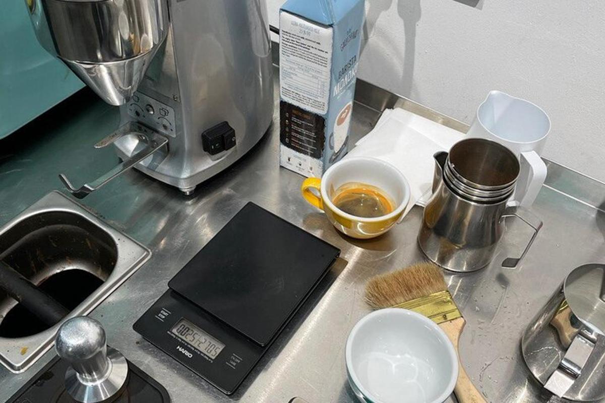 a kitchen counter with a counter top with a coffee maker