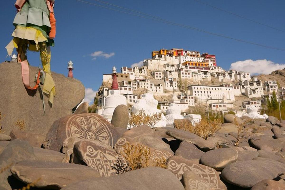a view of a town on a mountain with rocks