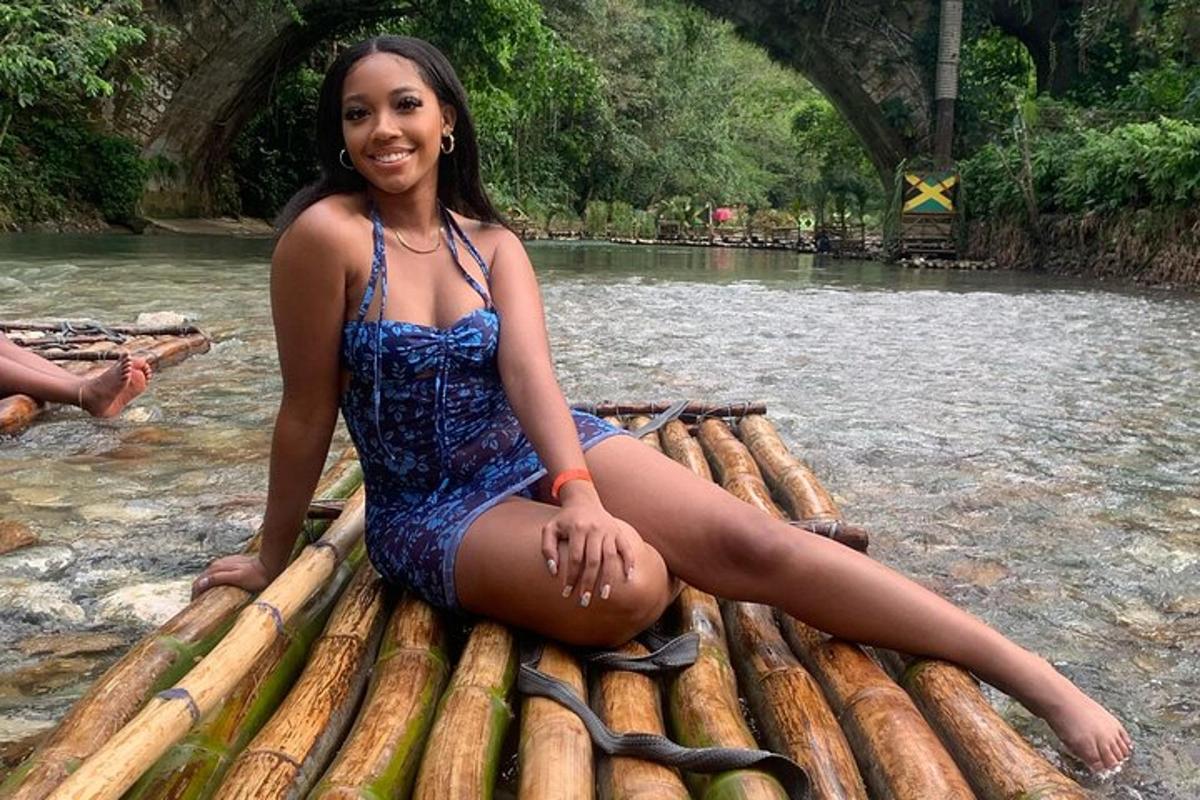 a woman sitting on a raft in the water