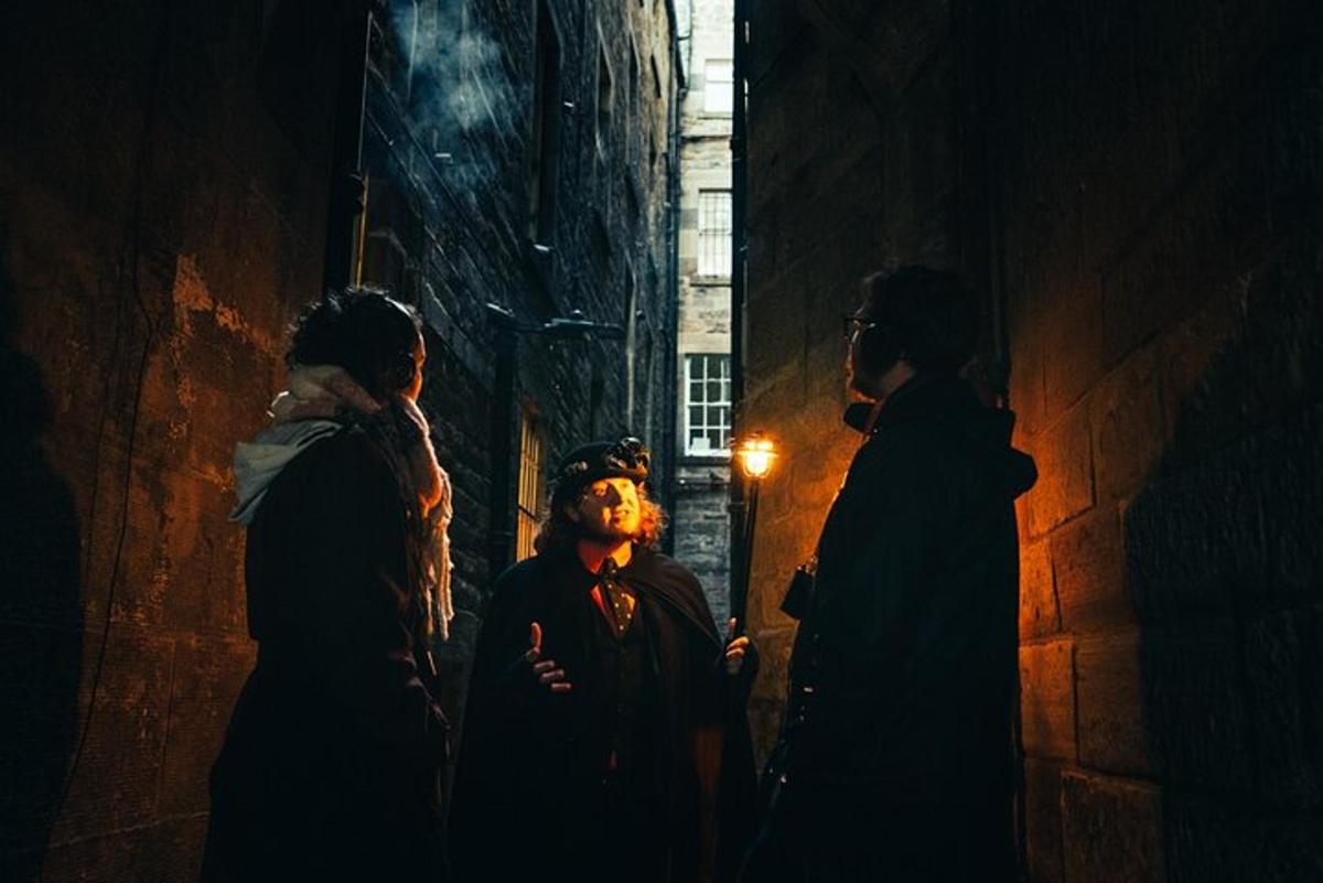 a group of people standing in an alley at night