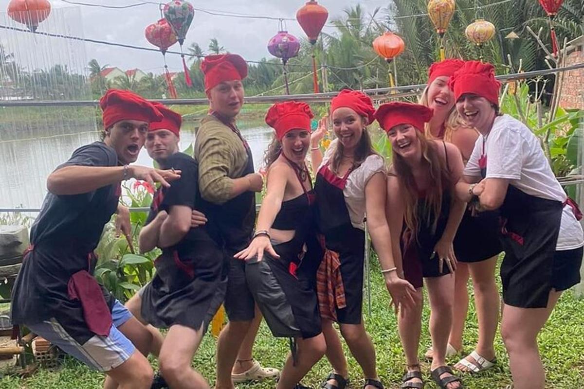 a group of people wearing red hats posing for a picture