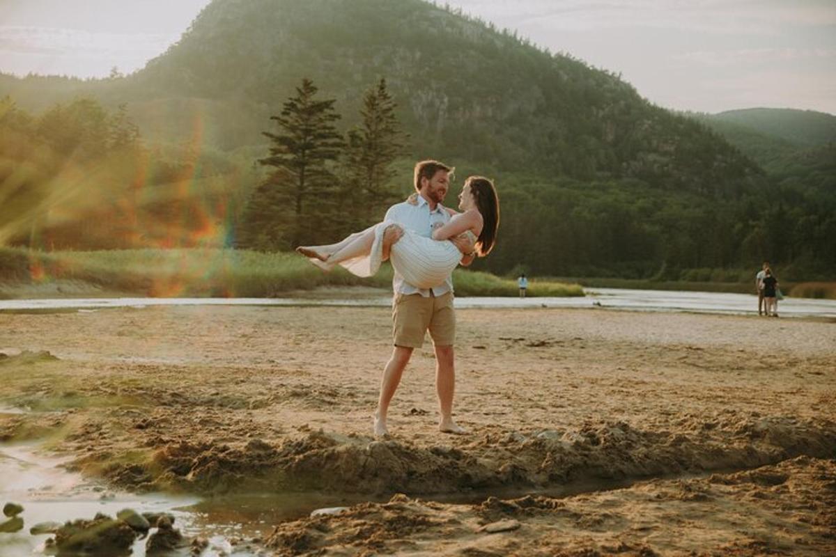 a man and a woman standing on a beach