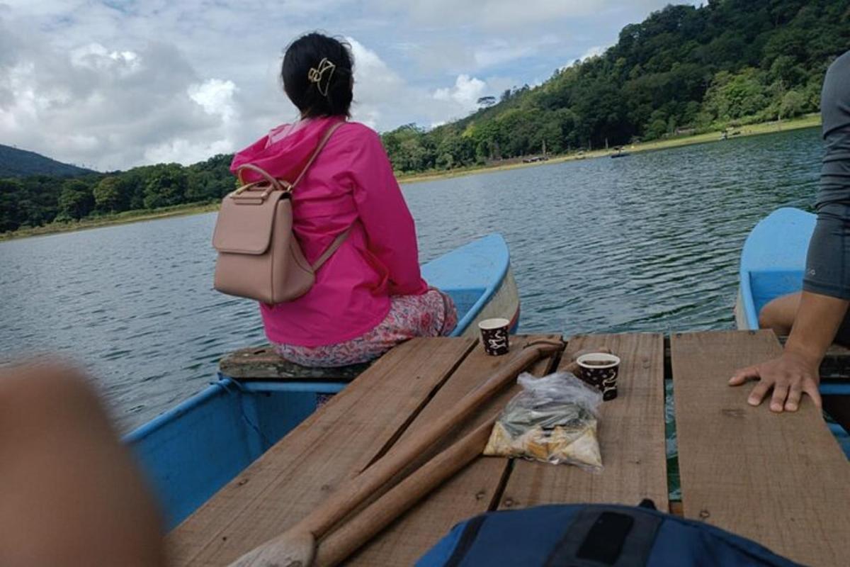 a woman sitting on a dock on a boat