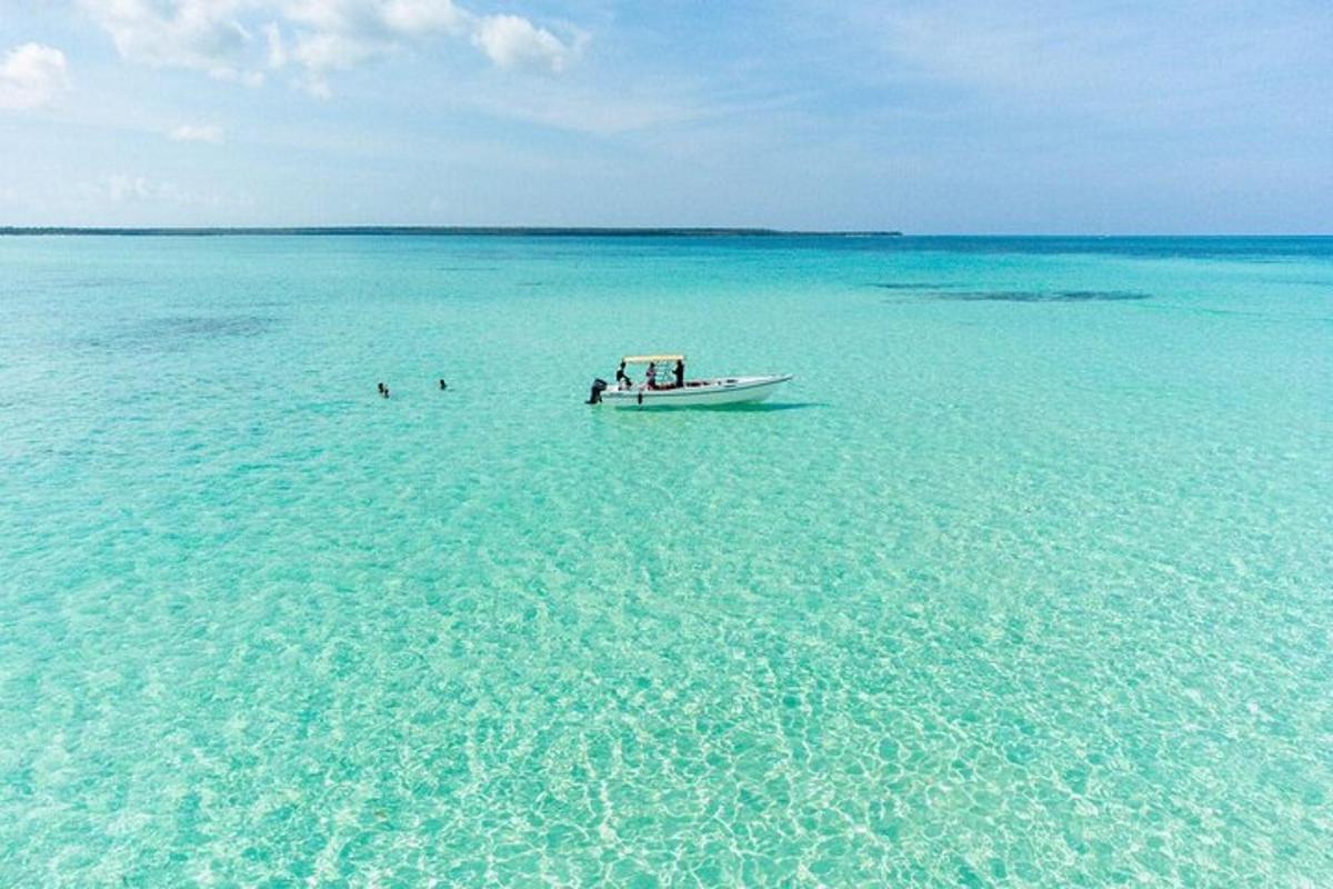 a boat in the middle of the ocean