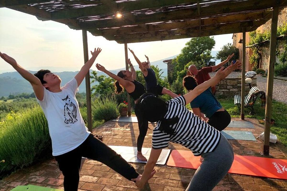 a group of people doing aorative yoga exercise