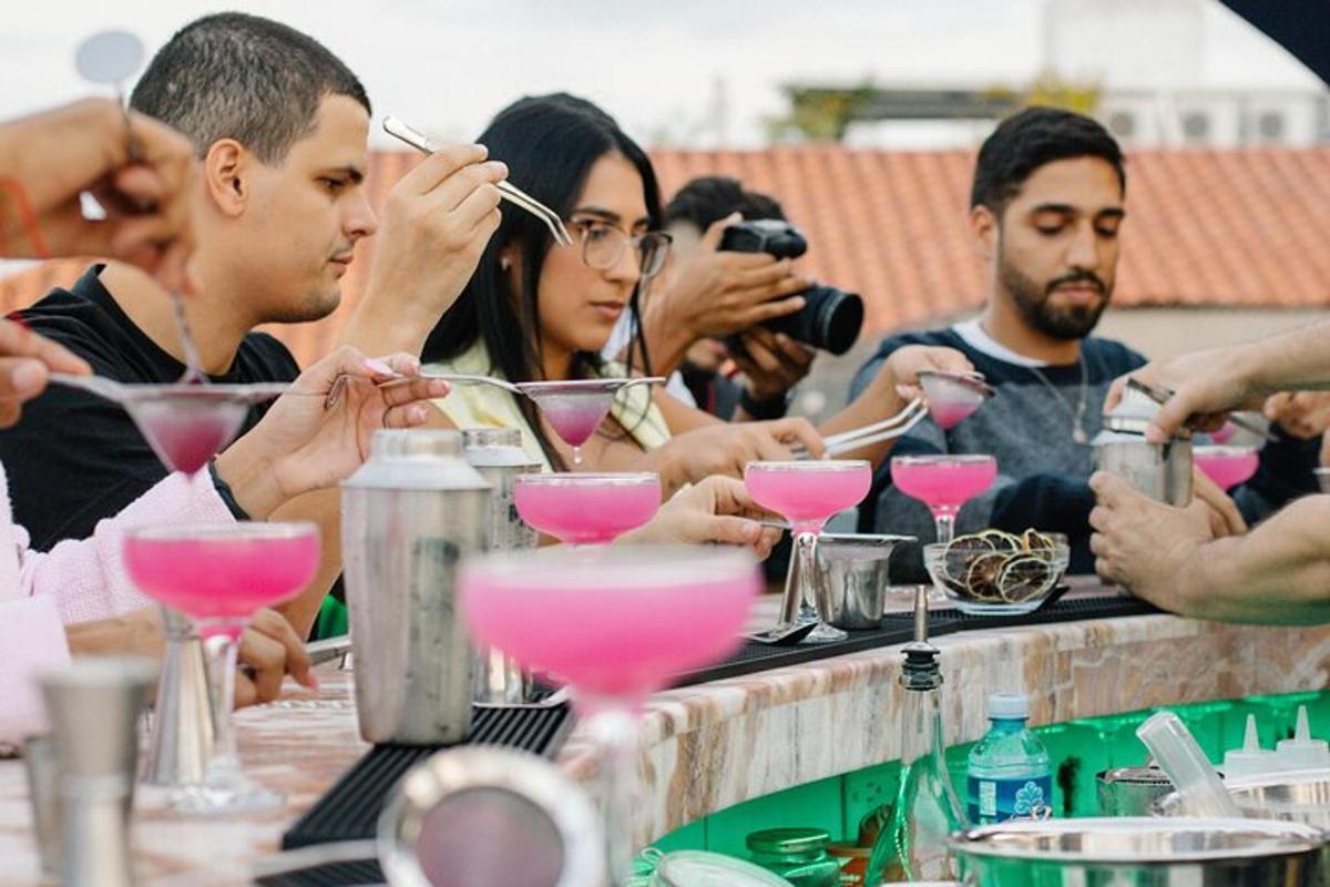 a group of people sitting at a table with drinks