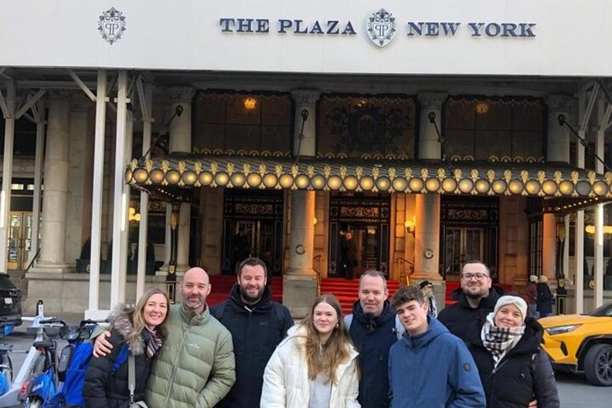 a group of people standing in front of a building
