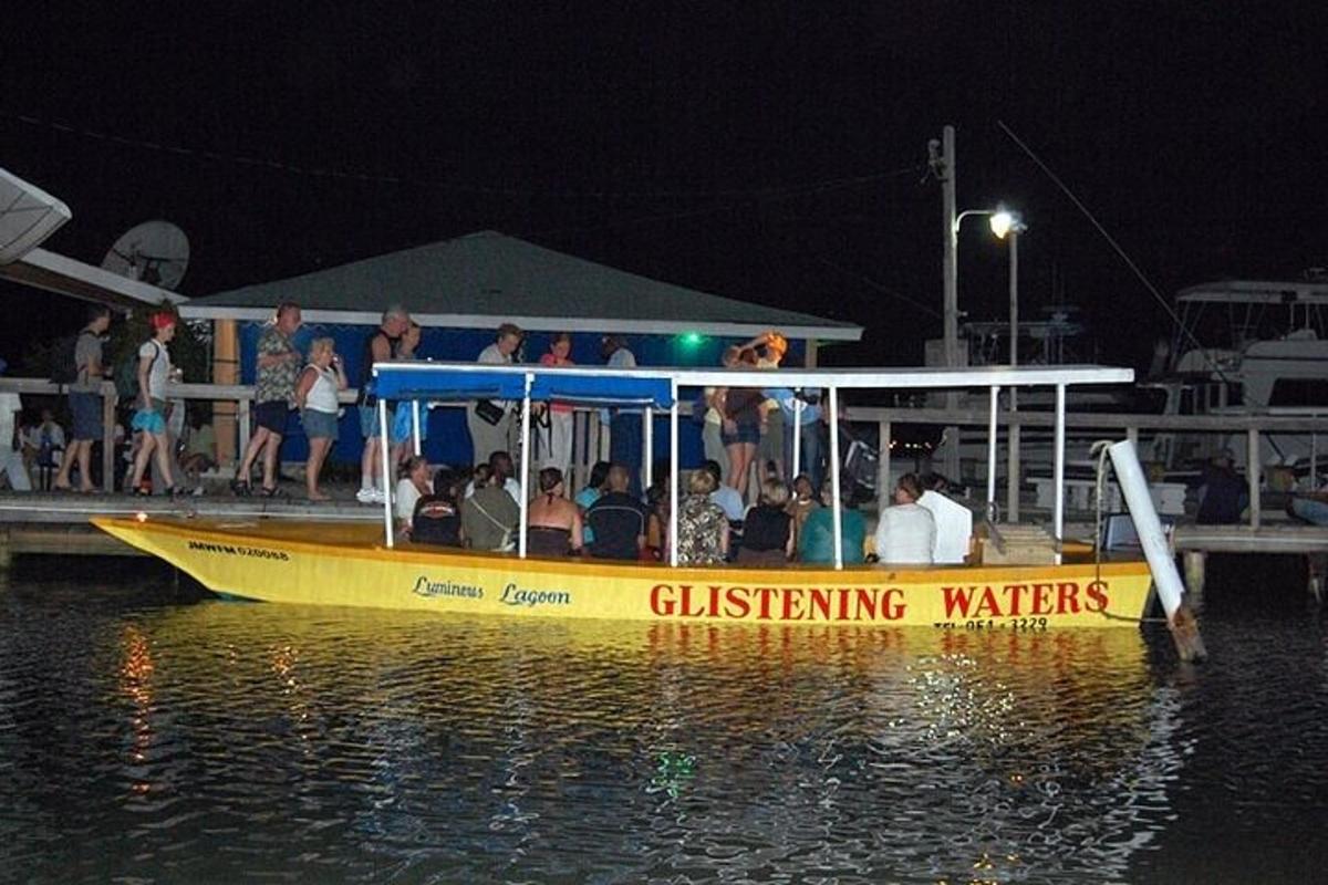 a group of people on a boat in the water