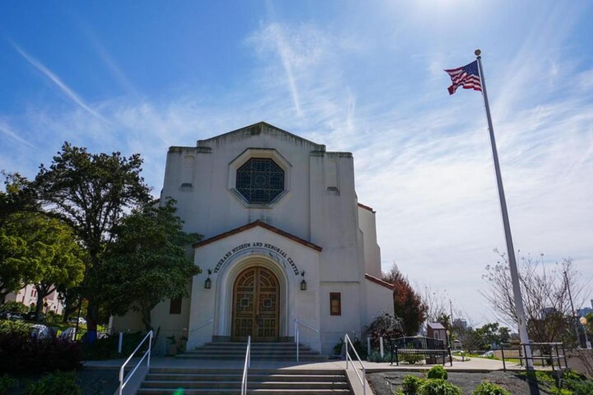 a white building with a flag in front of it