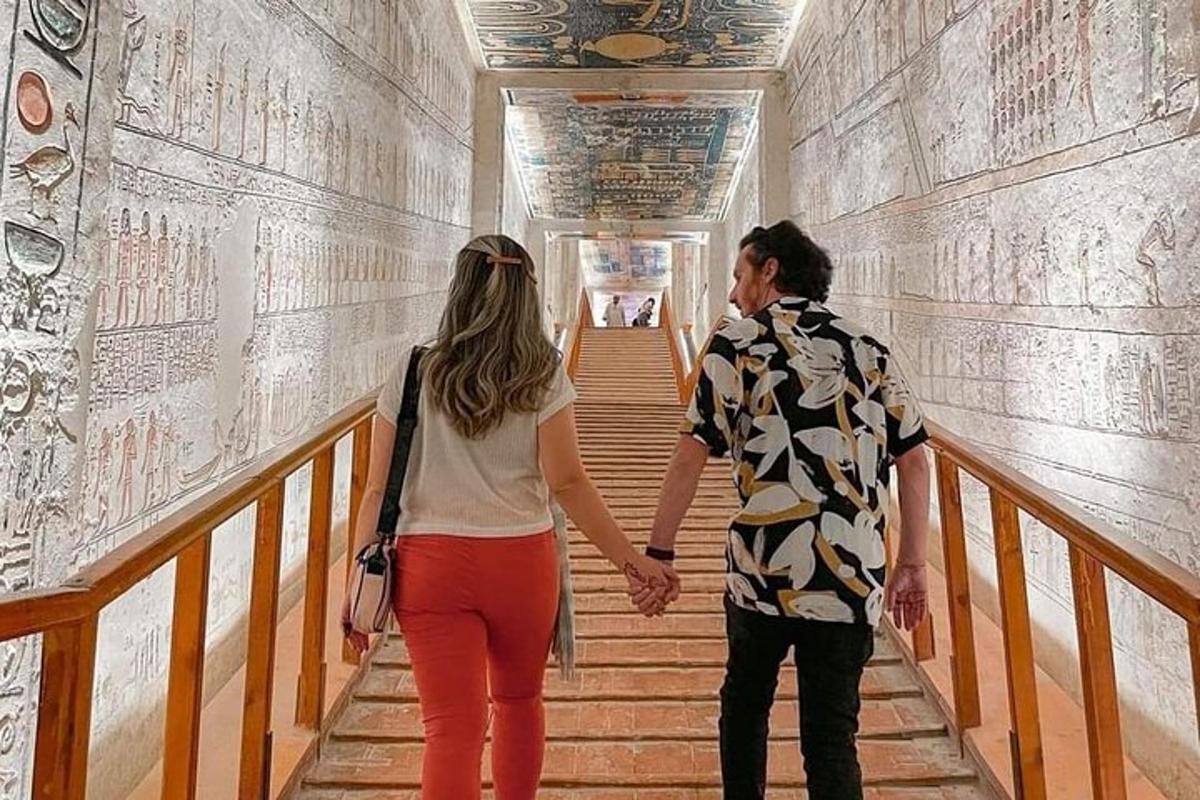 a man and a woman walking down the stairs