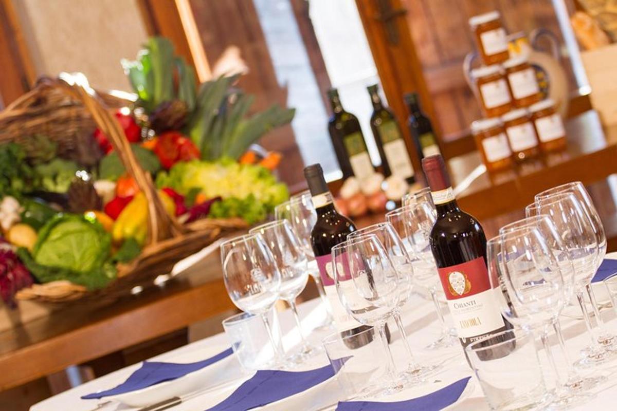 o masă cu pahare și sticle de vin pe ea
