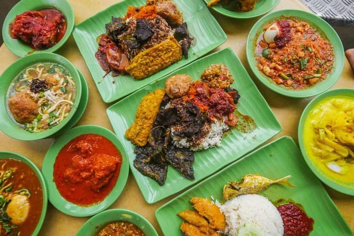 a table with green plates of food on it
