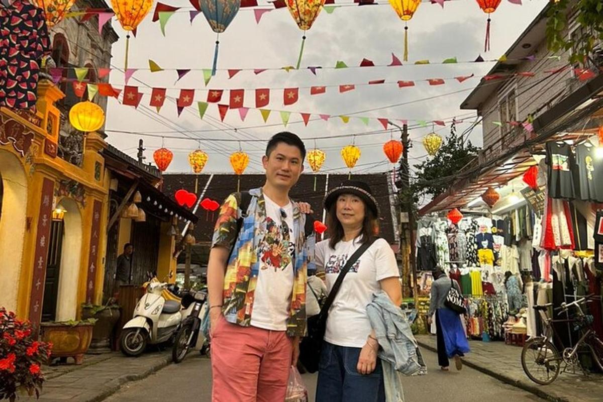 a man and a woman standing in a street