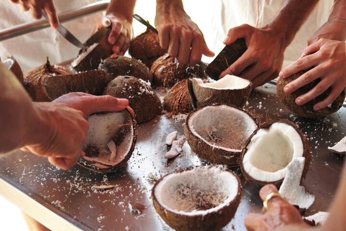 a group of people preparing food on a table