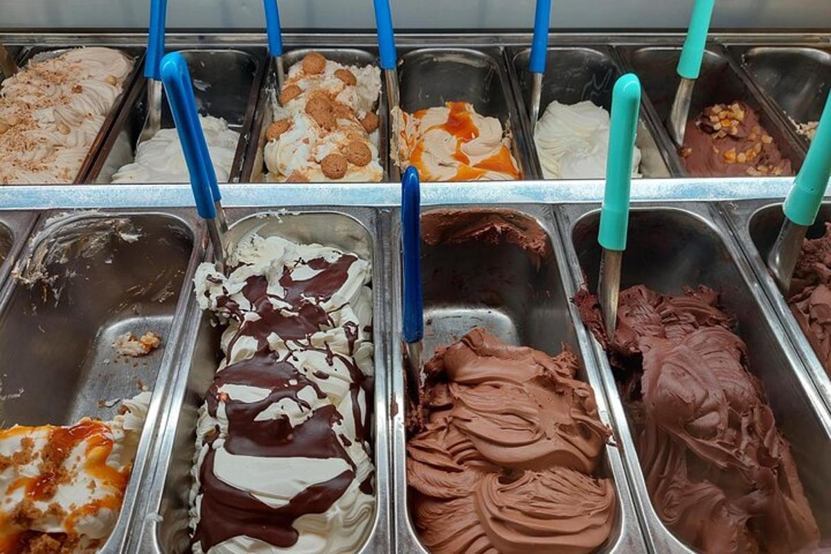 a tray of ice creaminis with tooth picks in them