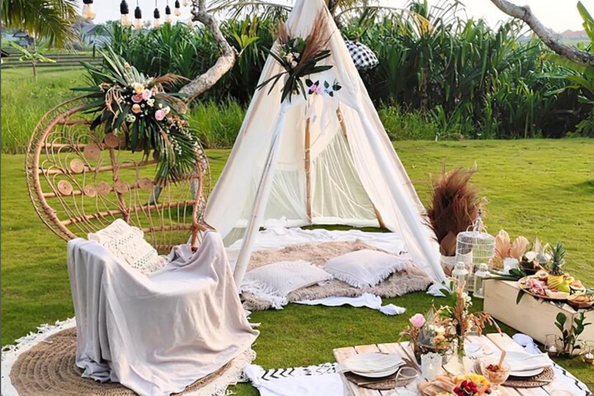 a tent with a table and a table set up