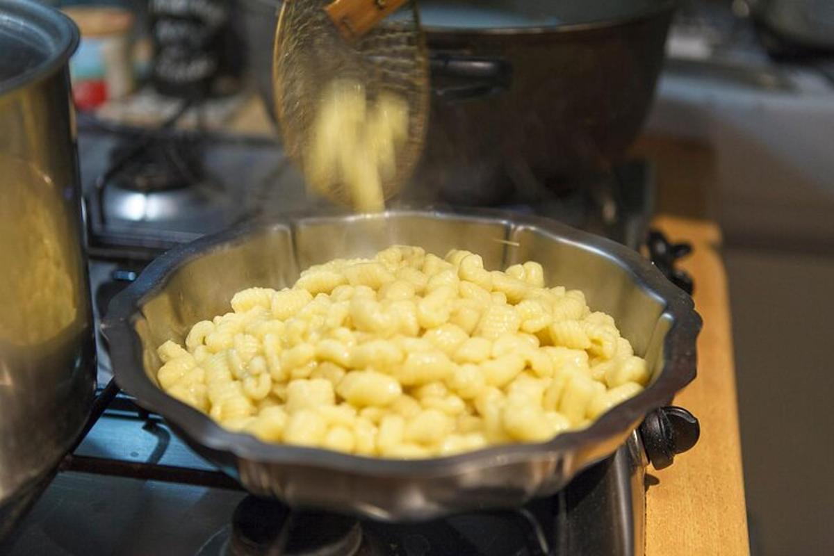 a pan filled with food on top of a stove