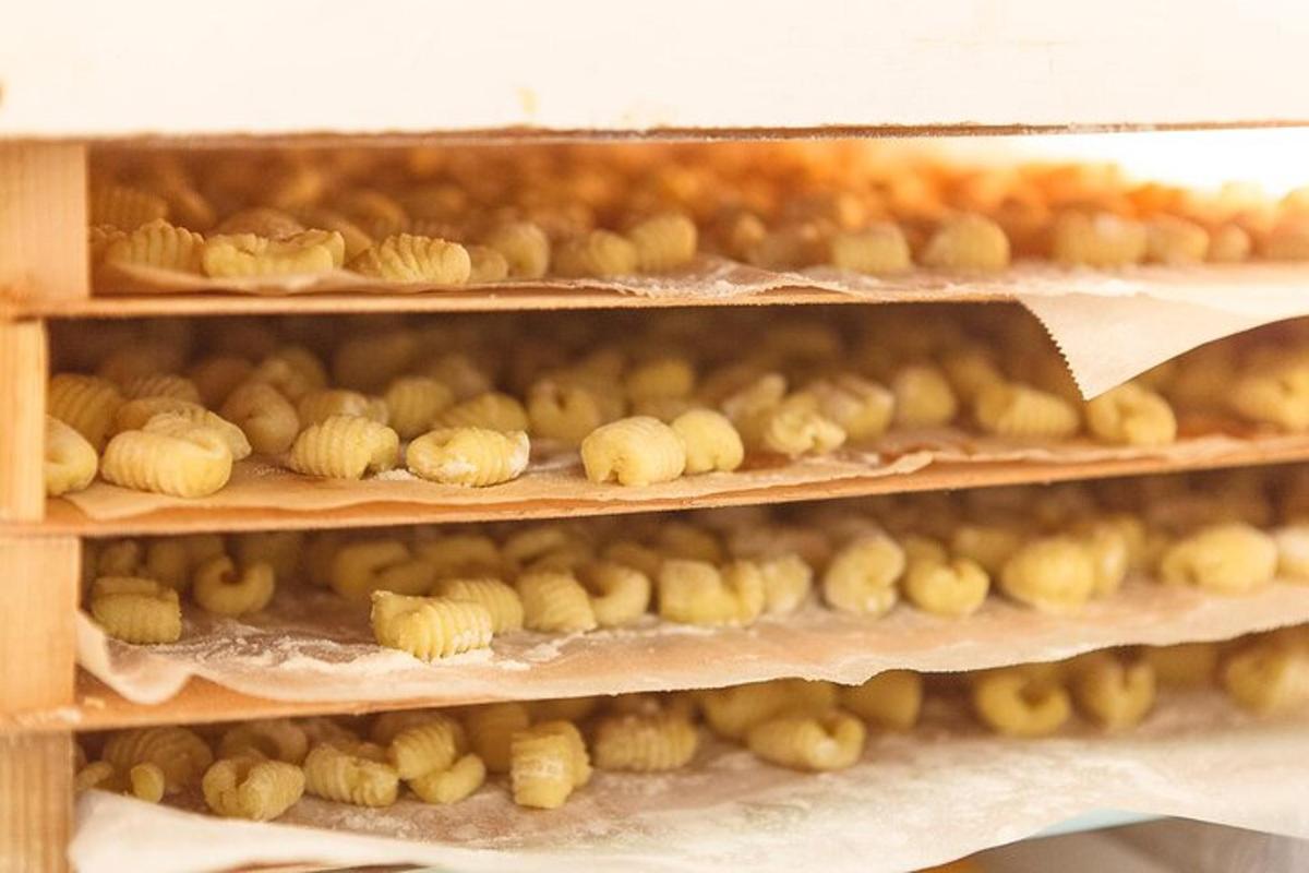 a shelf filled with lots of different types of bread