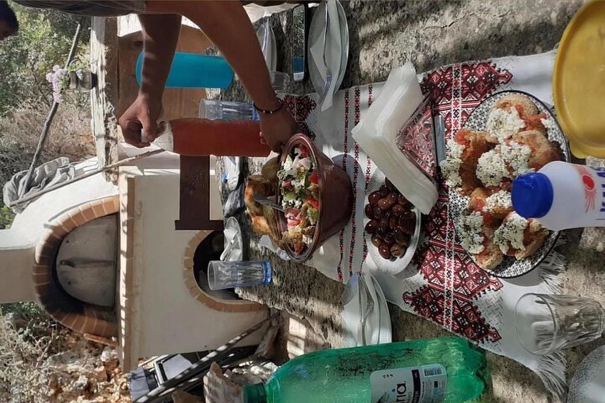 a person is cooking food on a table